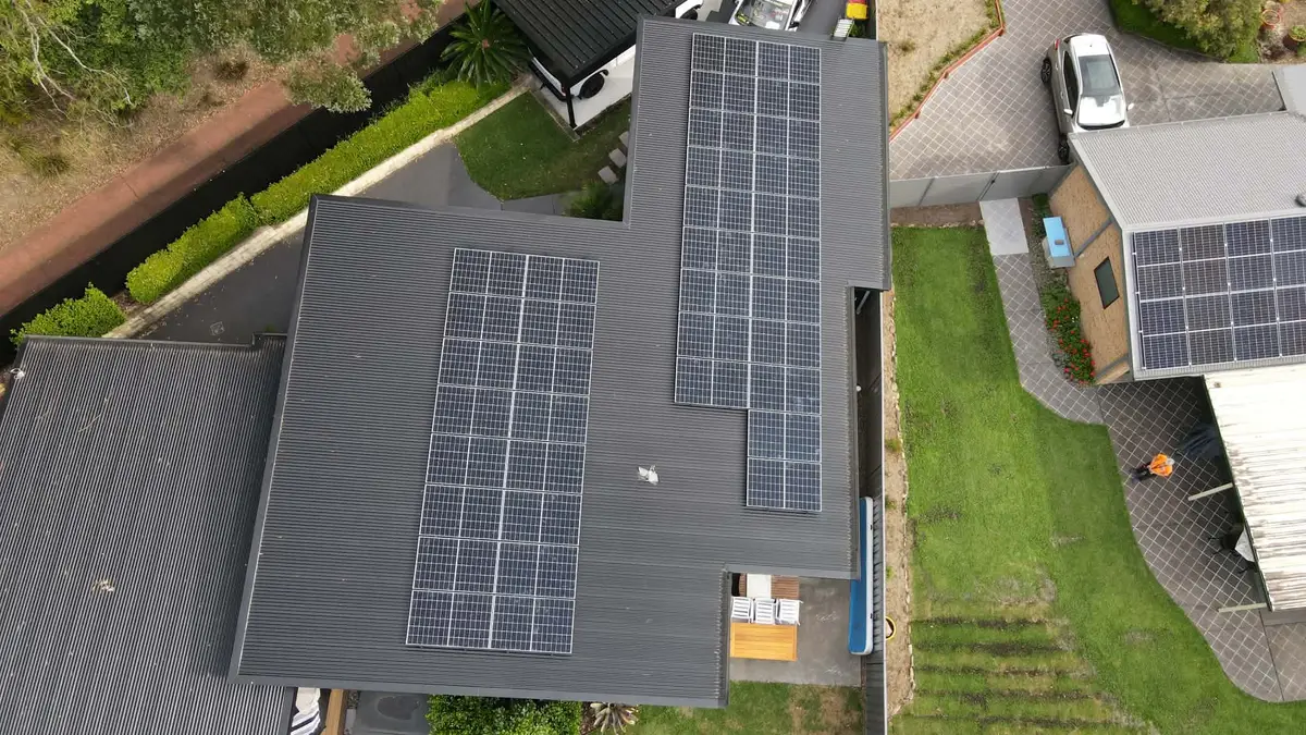 Aerial view of a rooftop solar panel system installed by All Things Power